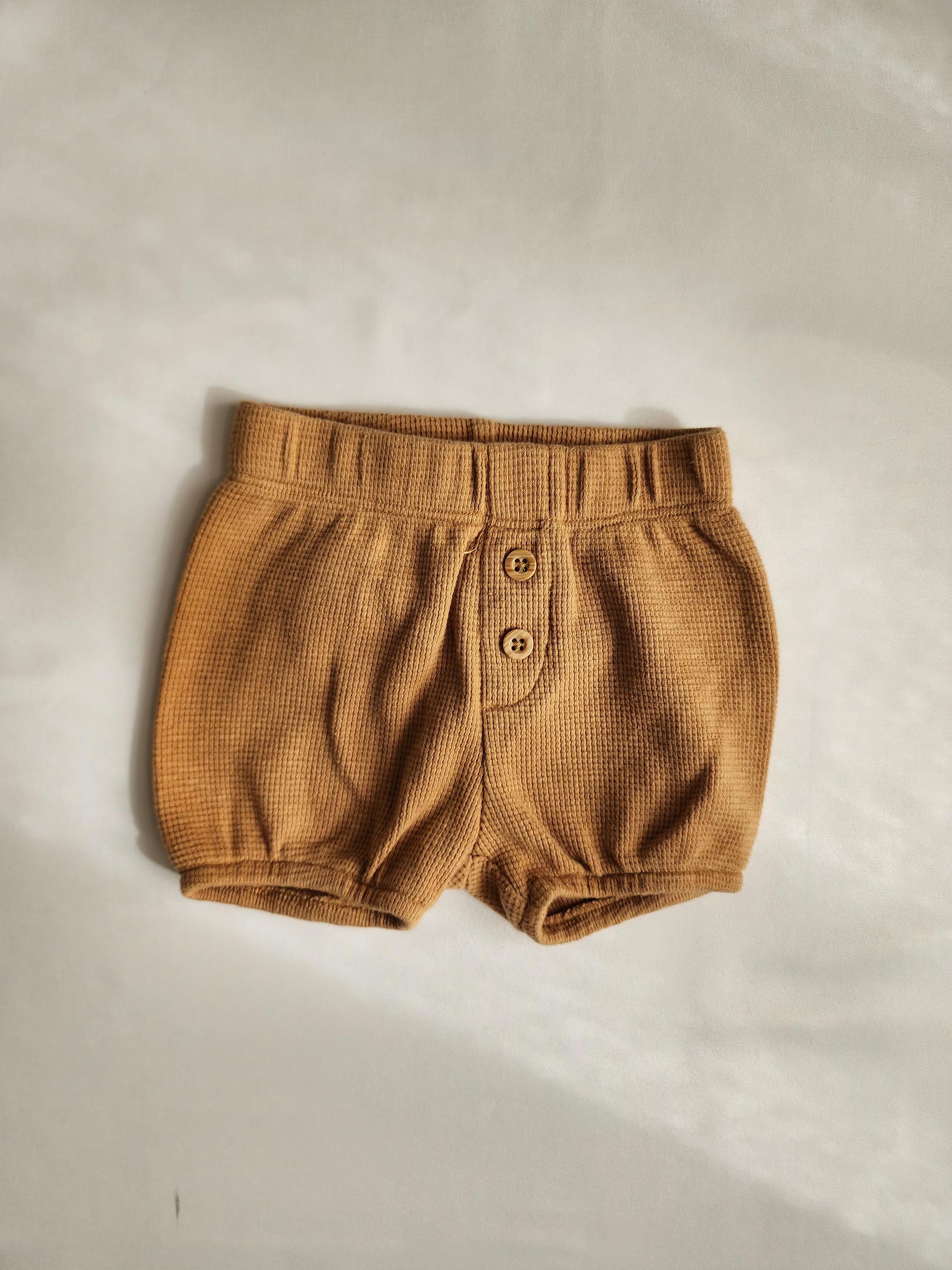 Short bébé Disney camel – 0-3 mois – en très bon état
