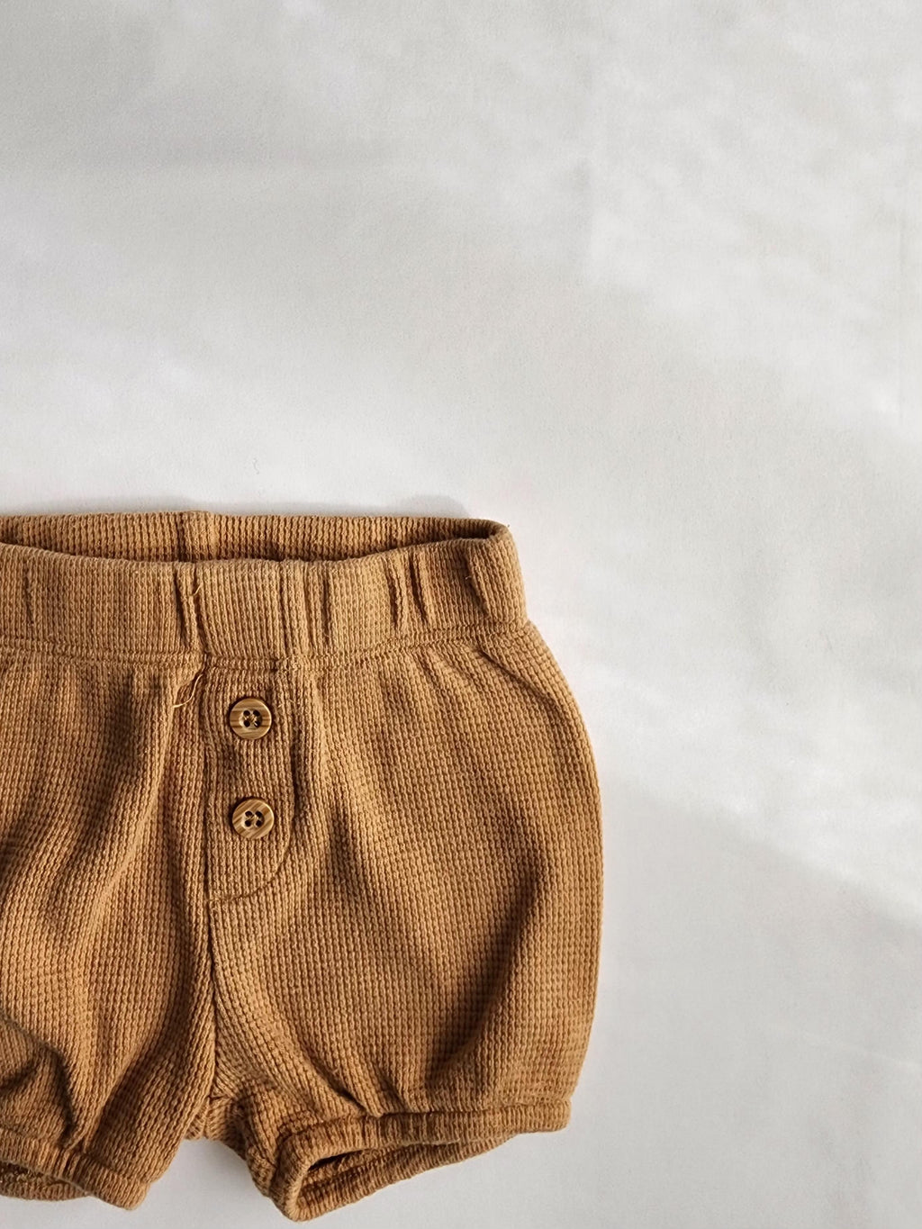 Short bébé Disney camel – 0-3 mois – en très bon état