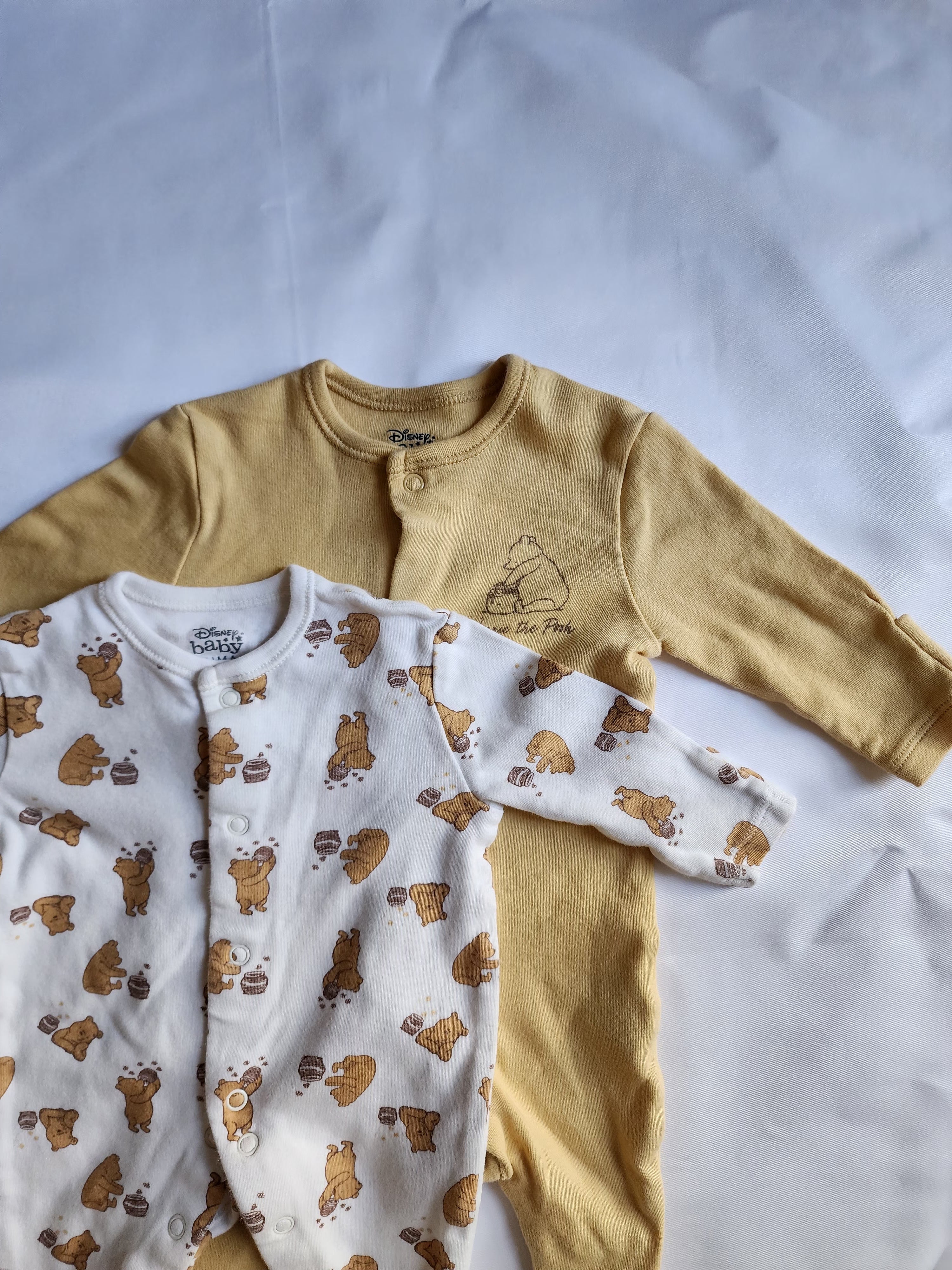 Lot 2 pyjamas Primark x Disney Baby – 0-1 mois – Très bon état