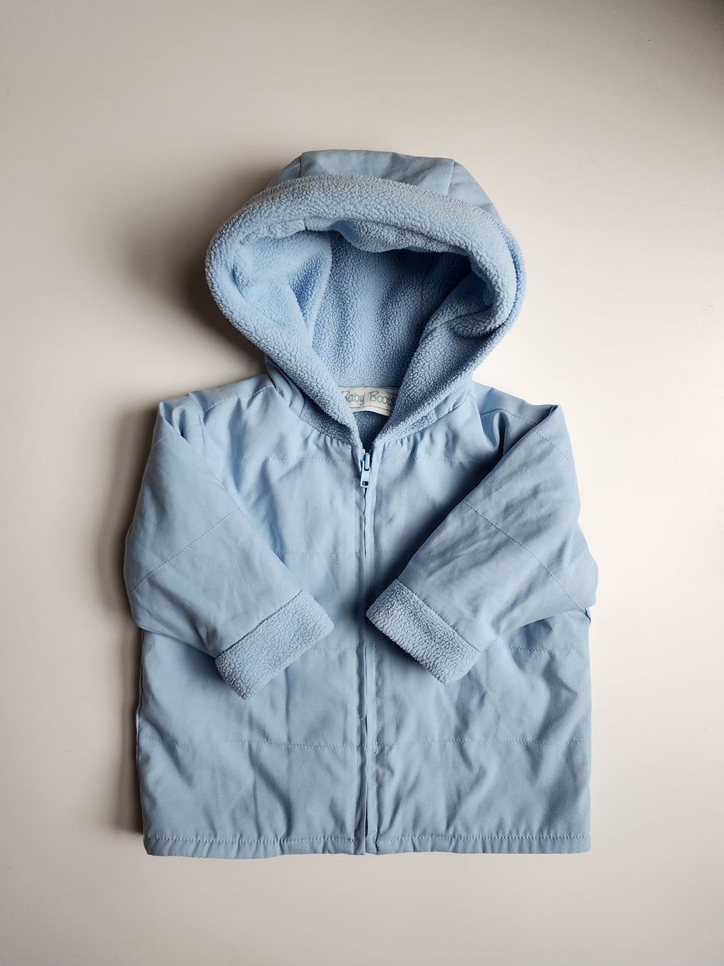 Blouson coupe-vent polaire – Bleu clair – 6 mois – Très bon état