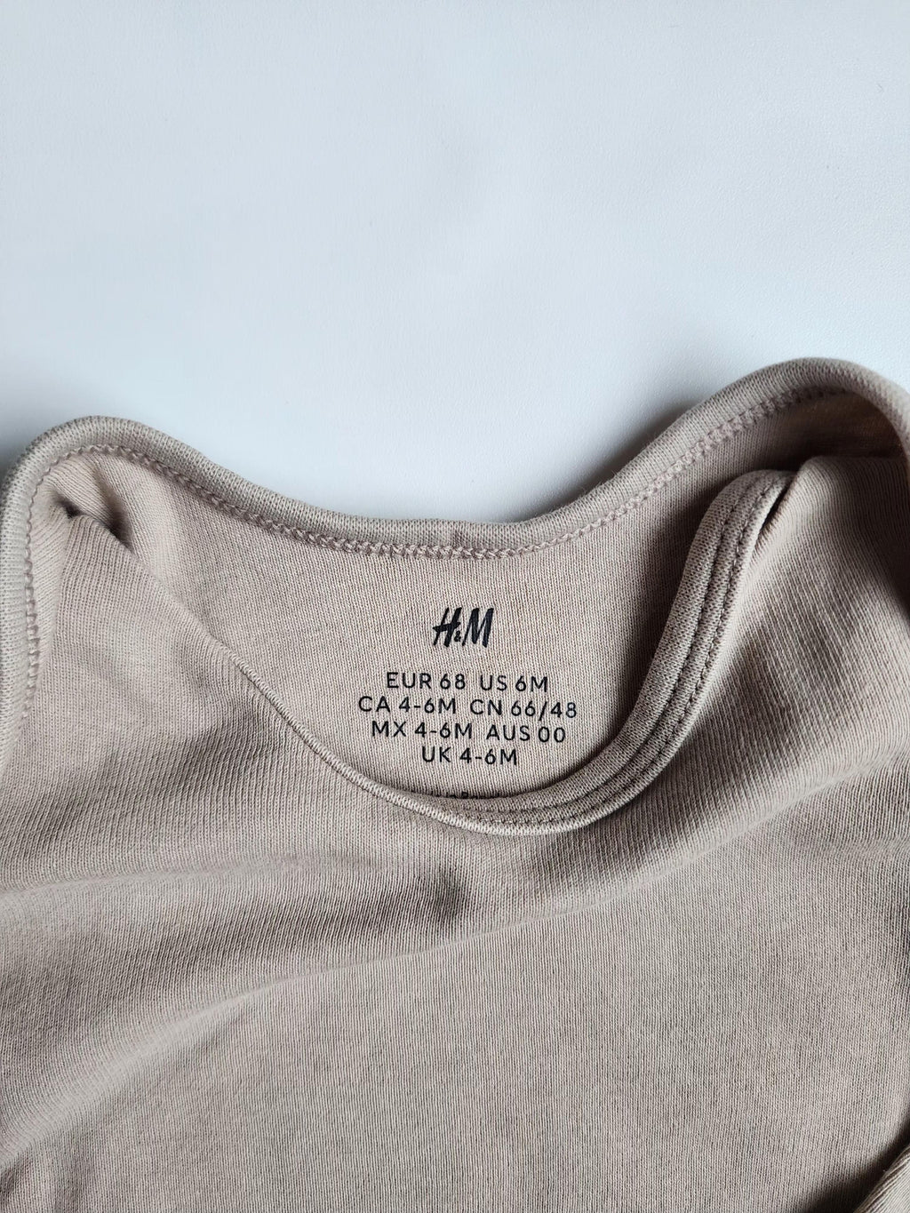 Body manches longues H&M – 4-6 mois – Très bon état