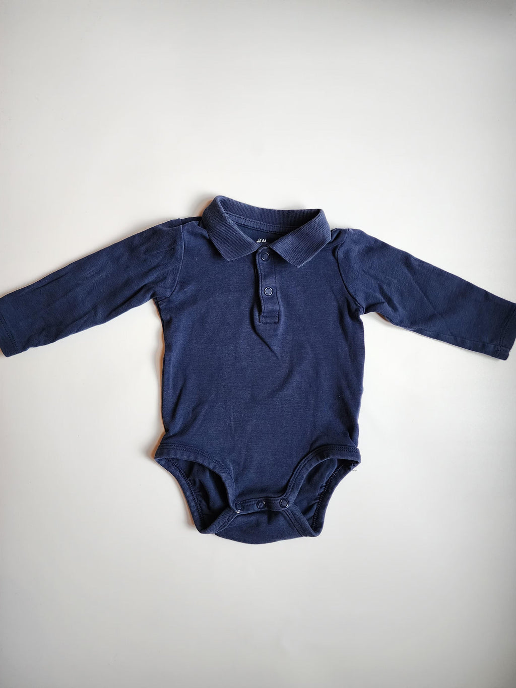 Body polo manches longues H&M – 4-6 mois – bon état